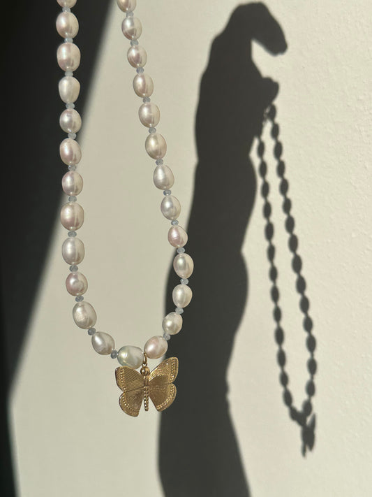 Baby blue butterfly pearl necklace