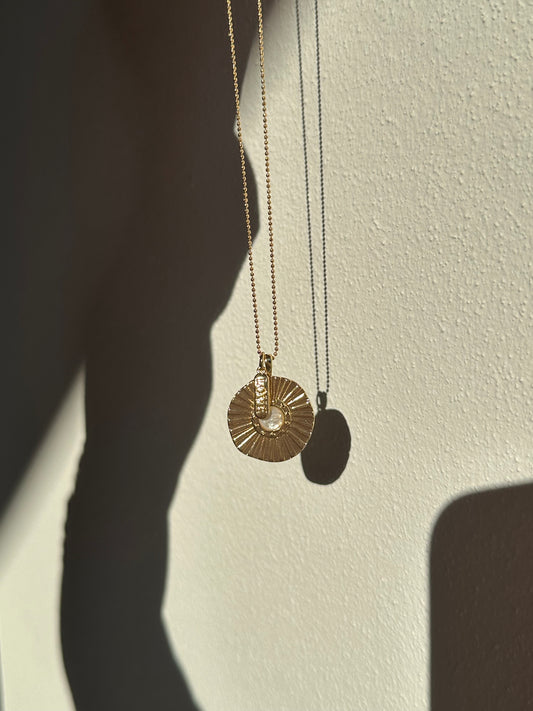 Sunburst mother of pearl coin necklace