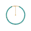 Turquoise beaded necklace with a gold clasp on a white background