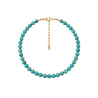 Turquoise beaded necklace with a gold clasp on a white background