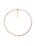 Necklace with shell-like beads on a white background