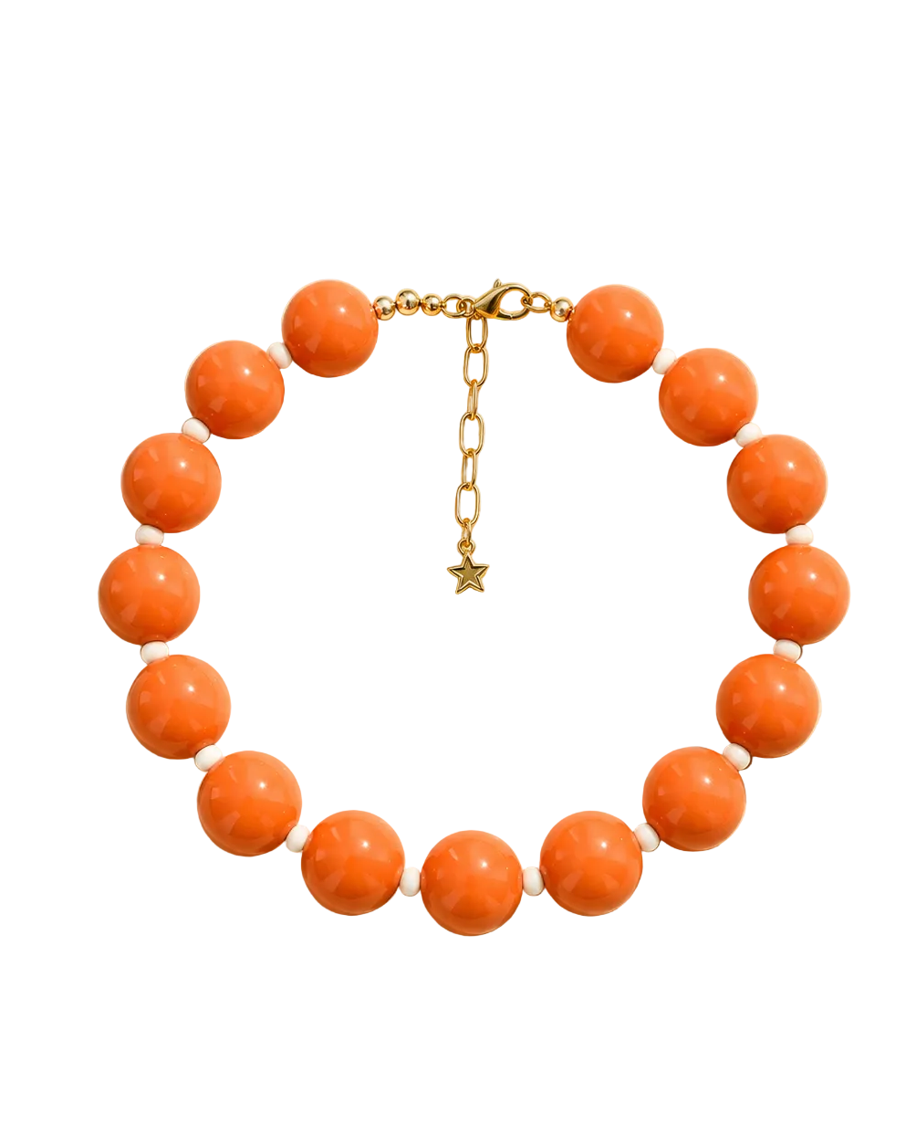 A beaded necklace with large round orange-brown beads separated by small white beads, with a gold chain clasp and star charm, displayed on a beige background with leaf shadows. Text above and below reads 'STACKED BY VALE' and 'CAPRI POP NECKLACE'.