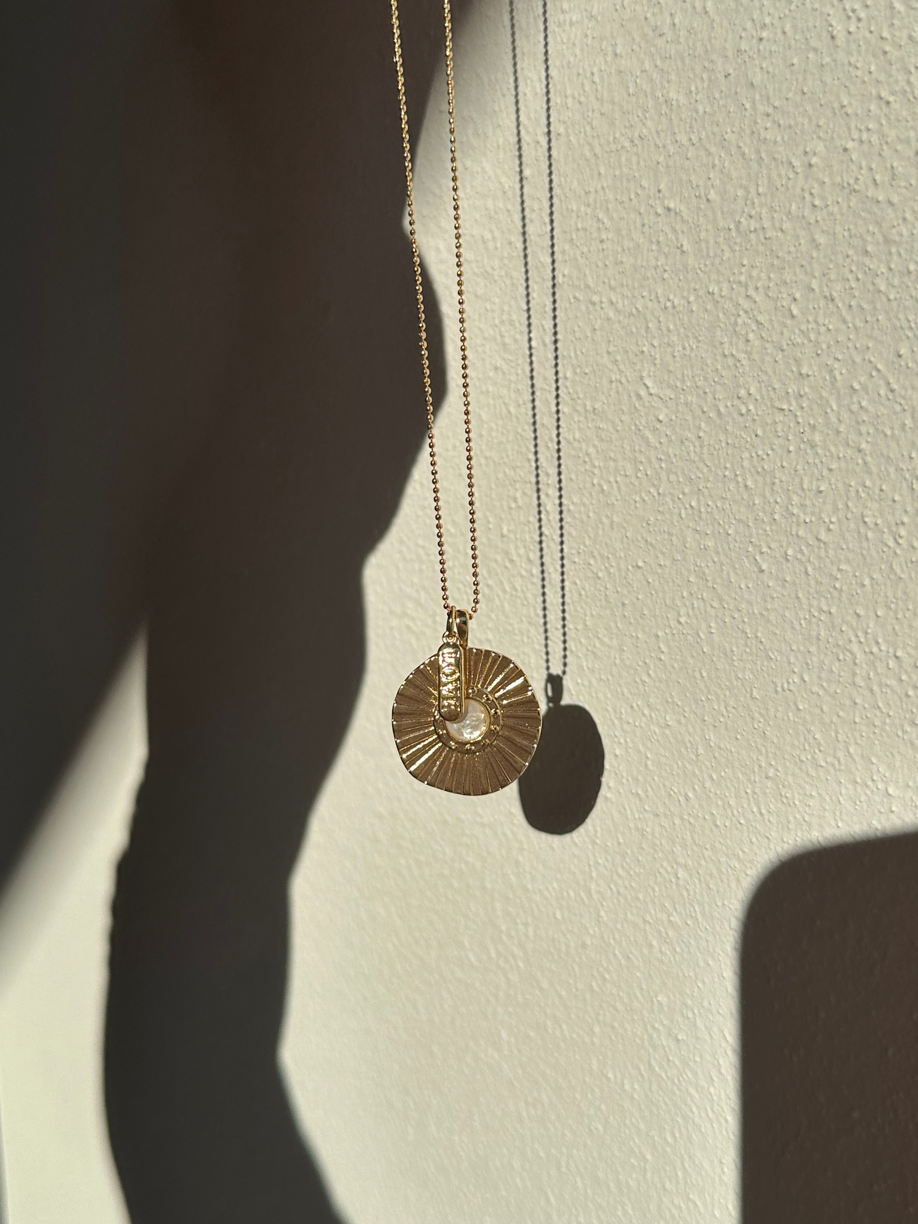 Sunburst mother of pearl coin necklace