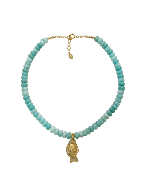 Turquoise beaded necklace with a gold fish pendant on a white background